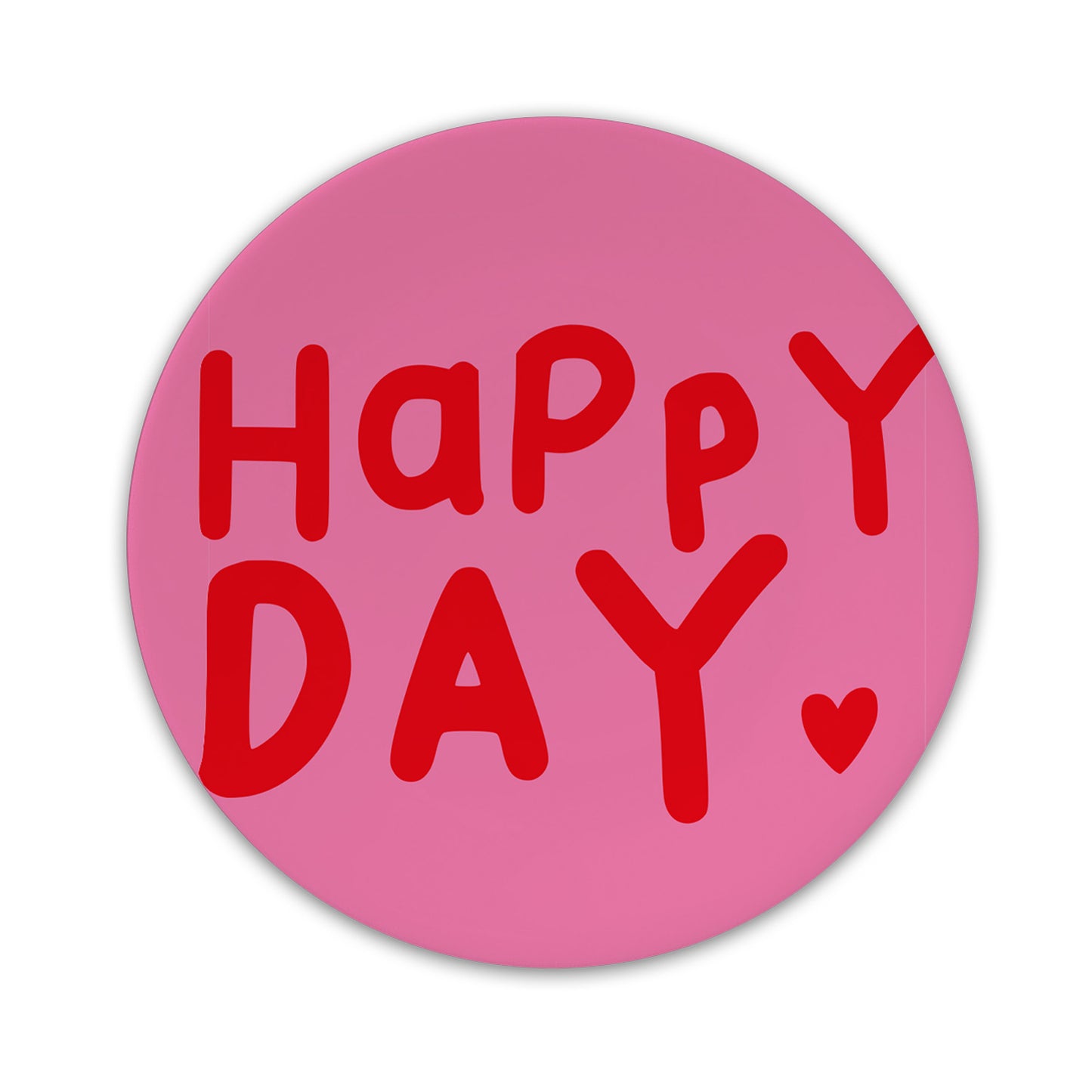 Ein kleiner, runder Teller aus rosa Porzellan mit der roten Aufschrift Happy Day und einem Herz.