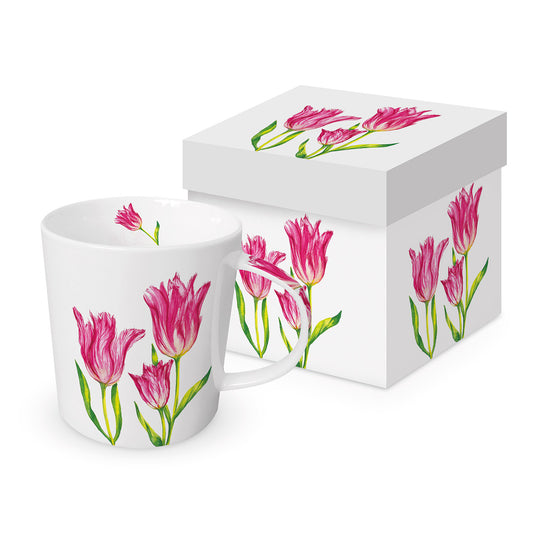 Eine weiße Porzellantasse mit pinkem Tulpenmotiv steht neben einer passenden Geschenkbox.