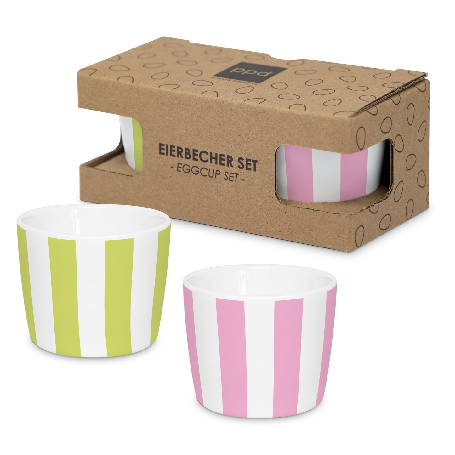 Zwei gestreifte Eierbecher in Grün und Rosa stehen vor ihrer passenden Geschenkverpackung aus Karton.