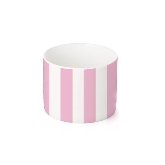 Eine kleine, zylindrische Schale mit einem vertikalen Streifenmuster in Pink und Weiß.