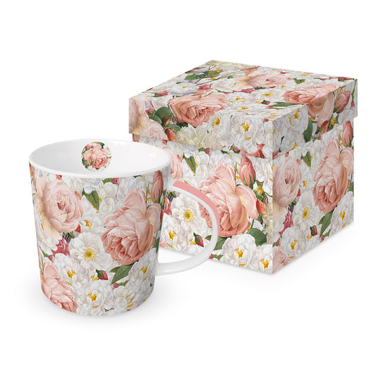 Eine Porzellantasse mit Blumenmuster und passender Geschenkdose im gleichen Design.