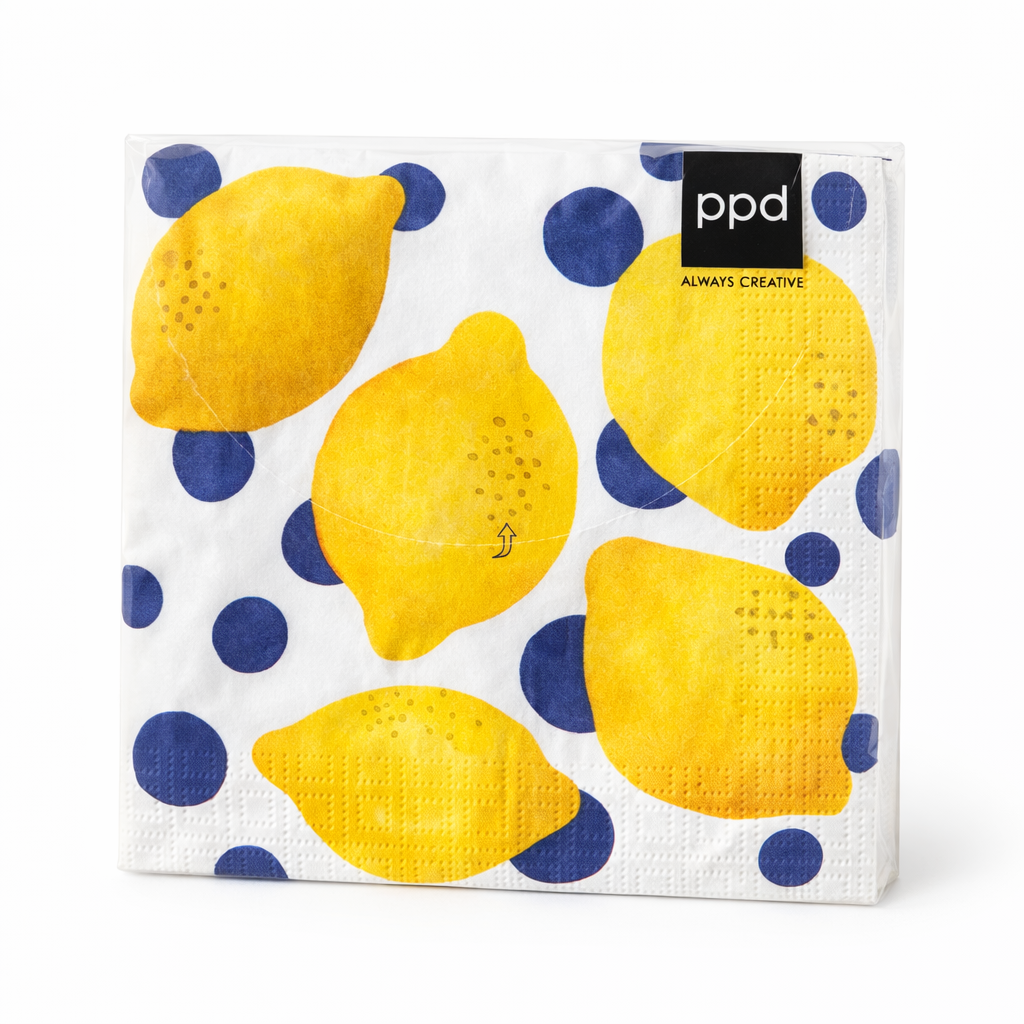 Eine Packung Papierservietten mit einem Muster aus gelben Zitronen und blauen Punkten.